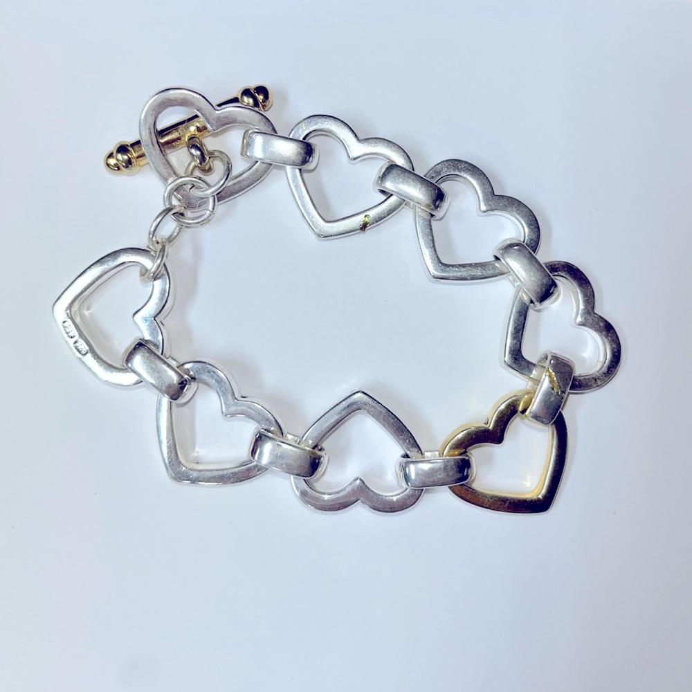 Sterling silver and gold plated heart bracelet.  Great condition!